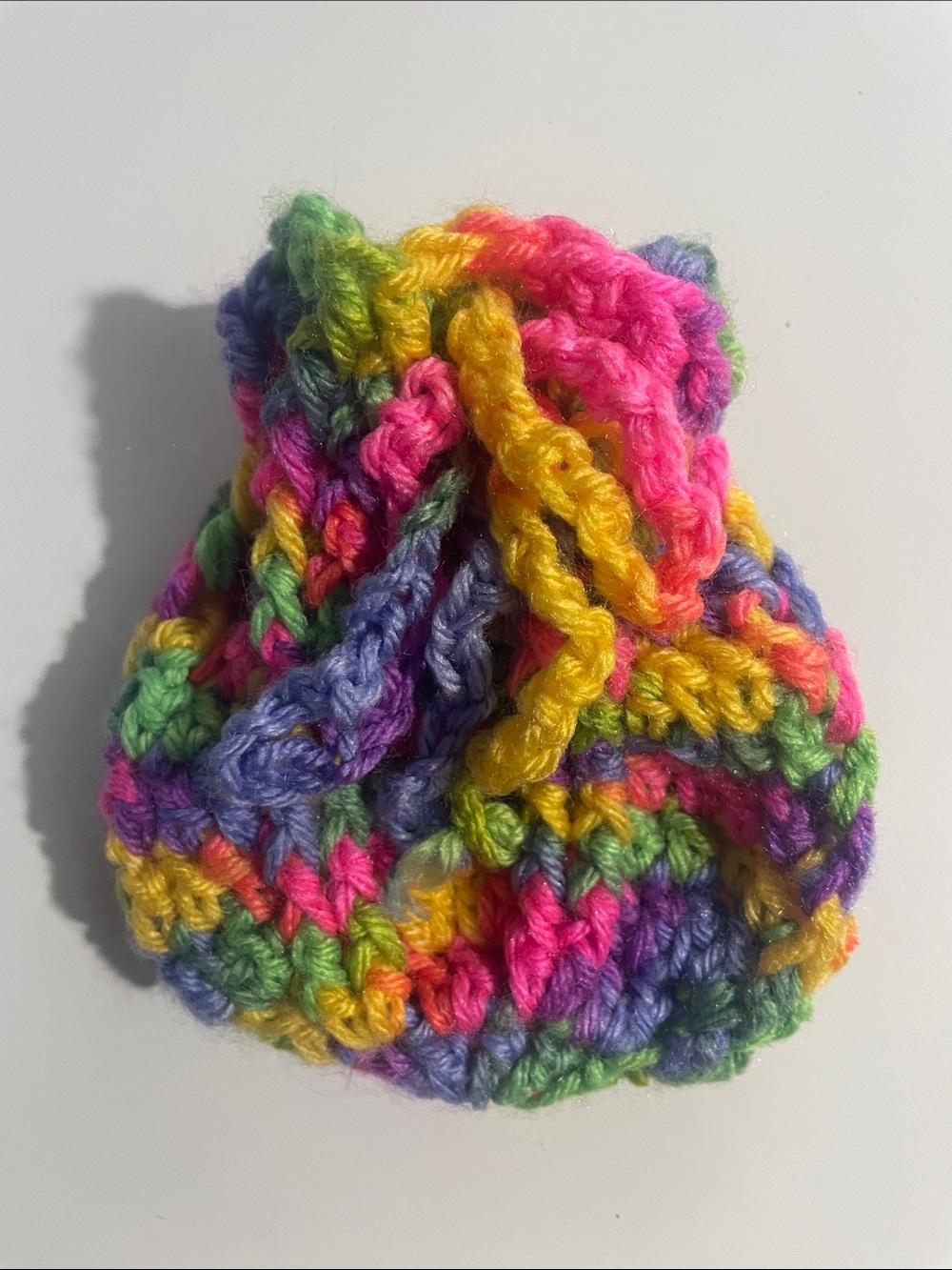 Miniature rainbow-colored pouch